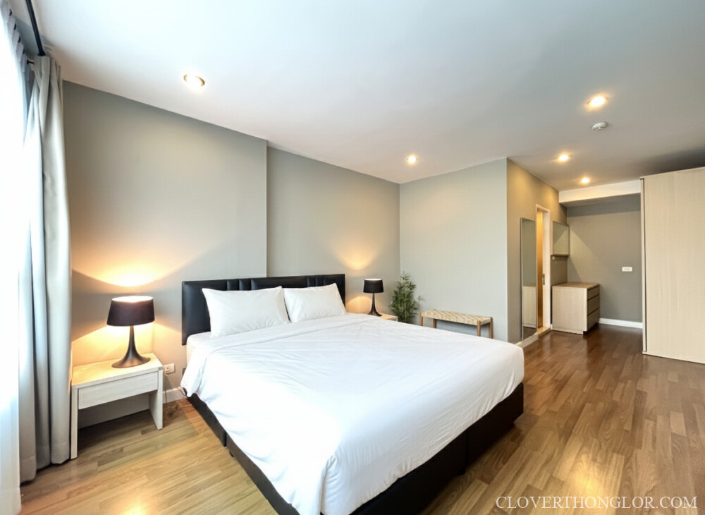 HTY master bedroom with white bed sheet