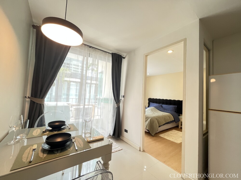 Modern dining area with bedroom view