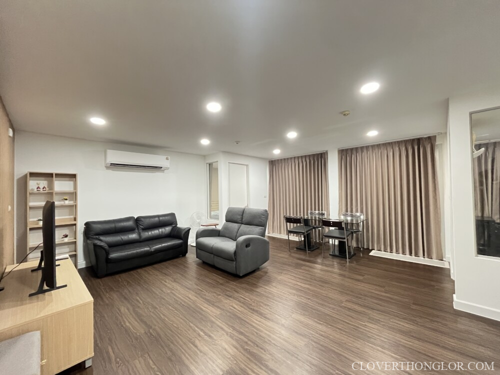 Modern extra large living room with furniture for a family