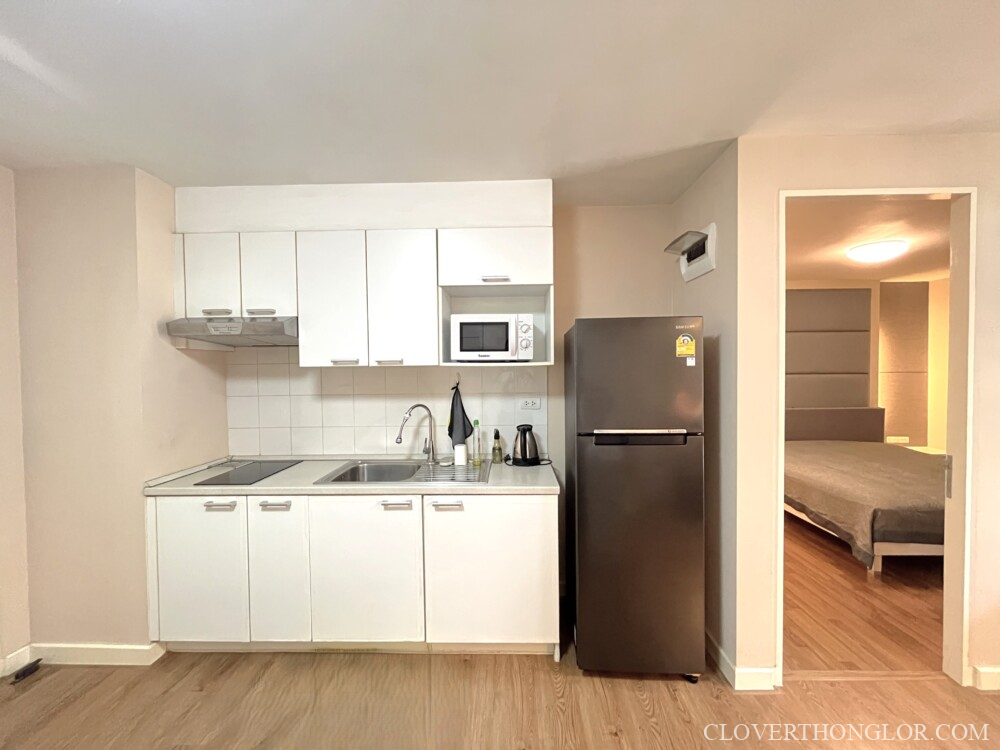 Modern kitchen with appliances and cabinets