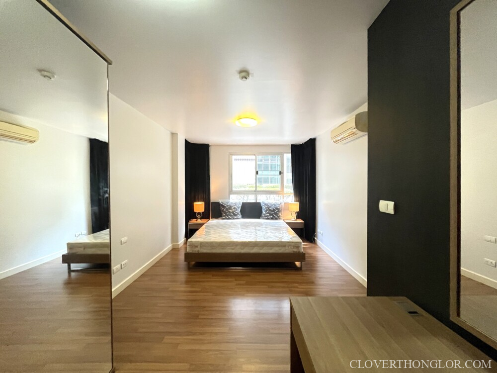 SNY cabinet and bedroom from bathroom