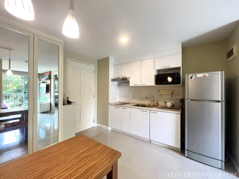 02 dining table and kitchen TAO